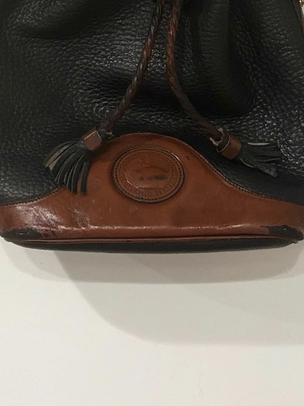 Dooney & Bourke Black and Brown Pebbled Leather Drawstring Hobo